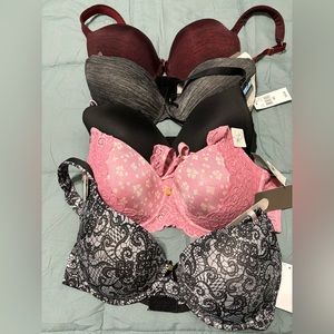 5 bras, 4 new with tags and 1 new without tags. All 40c